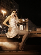giantess collage city black_hair high_heels stockings dress sitting legs night