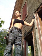 black_hair unaware outdoors point_of_view lara_croft combat_gear secret_agent