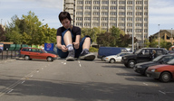 giantess short_hair sneakers parking_lot tomboy